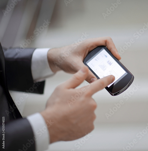 Close-up Of Businessperson Using Digital Tablet With Blank Display