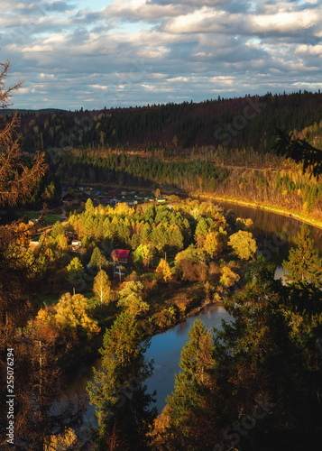 autumn landscape with river and trees photo