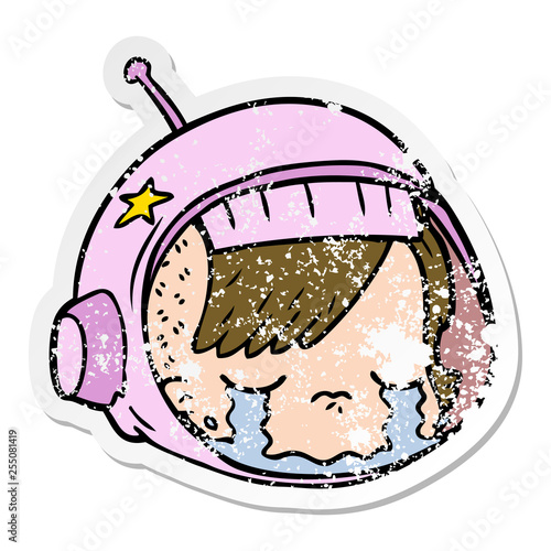 distressed sticker of a cartoon astronaut face crying
