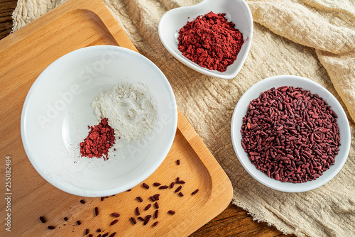 Fototapeta Naklejka Na Ścianę i Meble -  Chinese traditional natural pigment food red yeast rice powder coloring preparation process