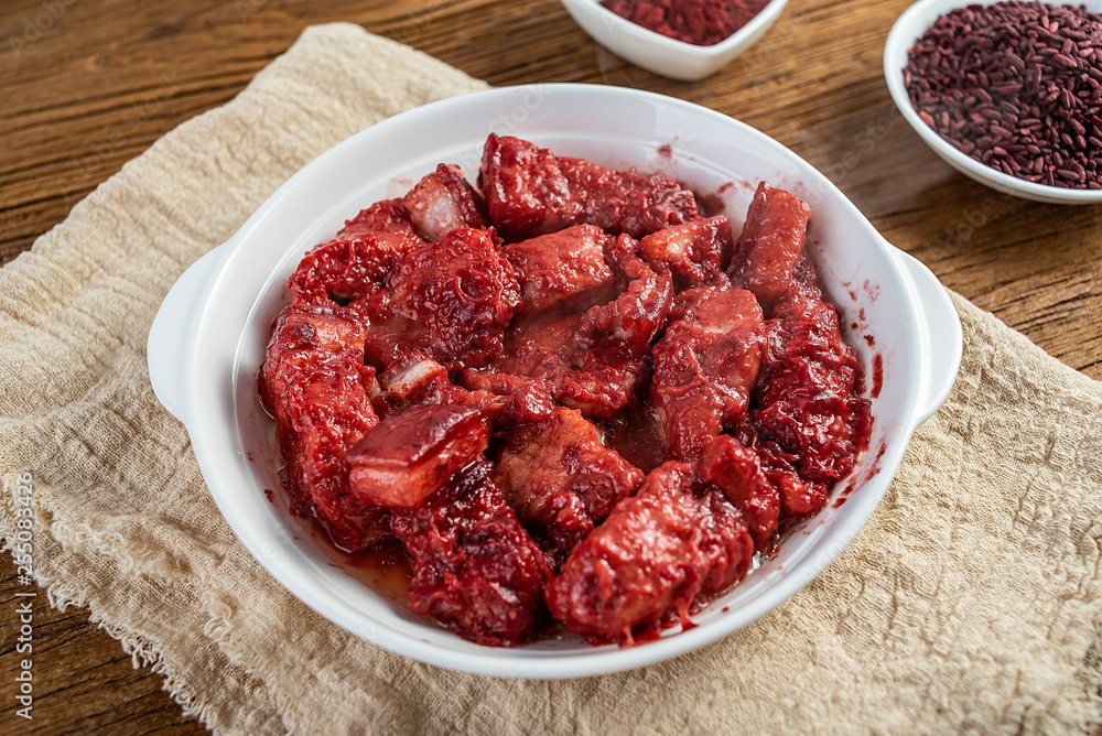 Chinese Hunan cuisine red yeast rice steamed pork Chinese Hunan cuisine red yeast rice steamed pork