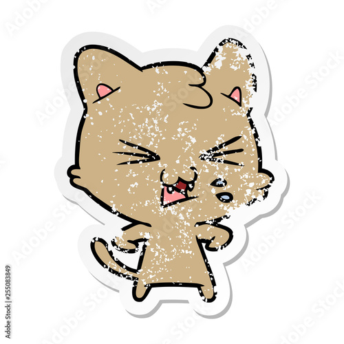 distressed sticker of a cartoon hissing cat