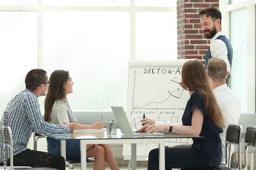 business team holds a meeting in a modern office