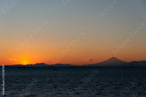 Sunset beyond mount Fuji, from Tokyo bay aqua-line © Kazu