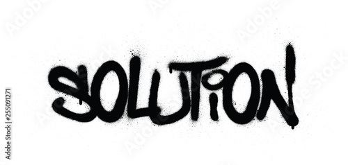 graffiti solution word sprayed in black over white