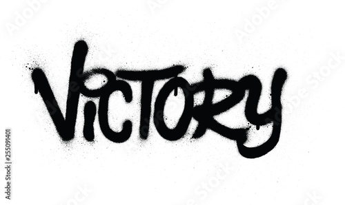 graffiti victory word sprayed in black over white