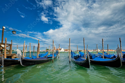 Gondolas and in lagoon of Venice by San Marco square. Venice, Italy © Dmitry Rukhlenko
