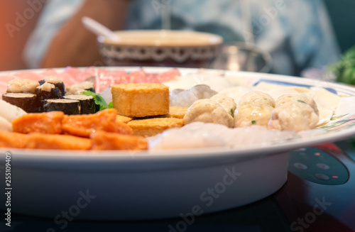 Assort many of Suki Hotpot Shabu set on hot pot, pork, fish, mussel, squid, egg, shrimp, fish ball ,Seaweed ,fish tofu ,woo