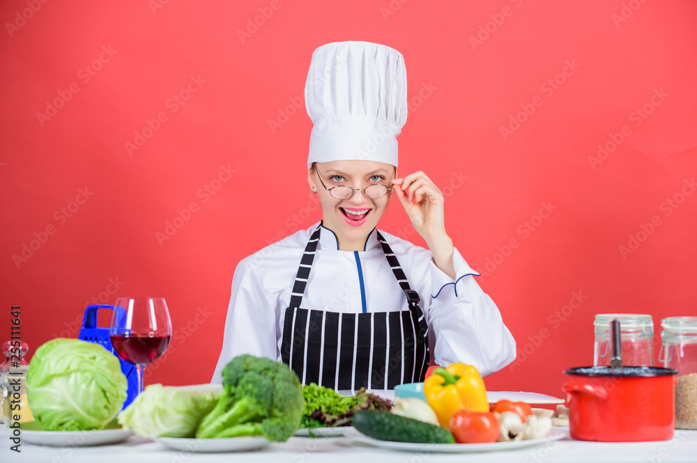 Culinary education. Culinary expert. Woman chef cooking healthy food. Fresh vegetables ingredients for cooking meal. Culinary school concept. Female in apron knows everything about culinary art Culinary education. Culinary expert. Woman chef cooking healthy food. Fresh vegetables ingredients for cooking meal. Culinary school concept. Female in apron knows everything about culinary art