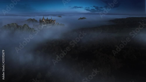 Aerial shot – Fantasy Castle in a foggy forest at night