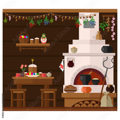 The interior of a Russian village house with a Russian stove, prepared for the celebration of Easter. Traditional cuisine of the farmhouse.