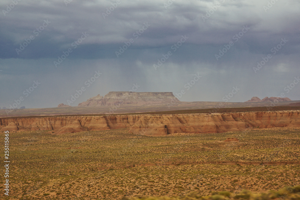 Fototapeta premium red rock desert rain and thunder coming