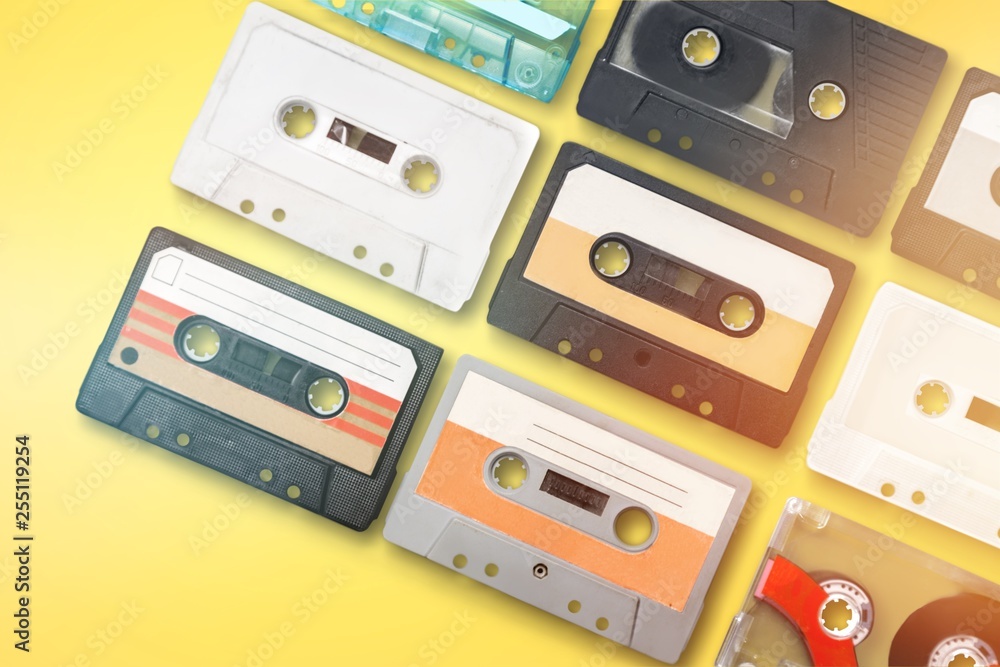 Fototapeta premium Collection of retro audio tapes on background