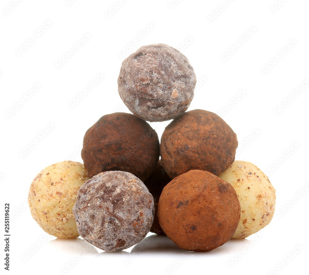 chocolate candies. candies of different chocolate on a white isolated background. close-up chocolate candies. candies of different chocolate on a white isolated background. close-up