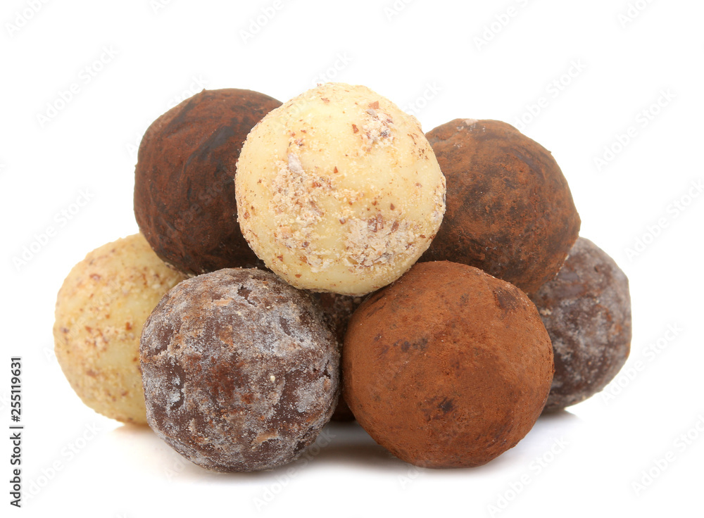 chocolate candies. candies of different chocolate on a white isolated background. close-up chocolate candies. candies of different chocolate on a white isolated background. close-up