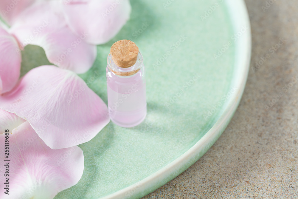 rose water in a glass bottle rose water in a glass bottle
