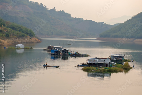 Houses and peaceful life on Lake Nam Ka, Dac Lak, Viet Nam © Nguyen