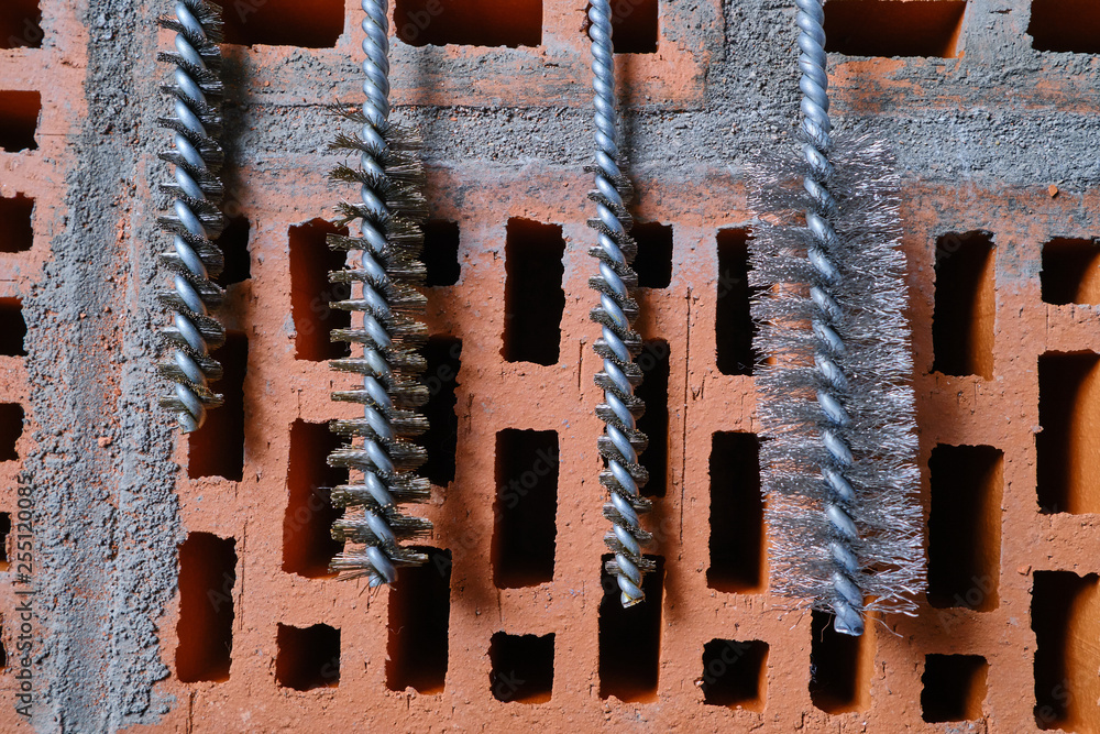 set of parts for mounting anchors in hollow brick and concrete lie on