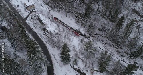 TMR train leaving les Marécottes, form above - Aerial 4K photo