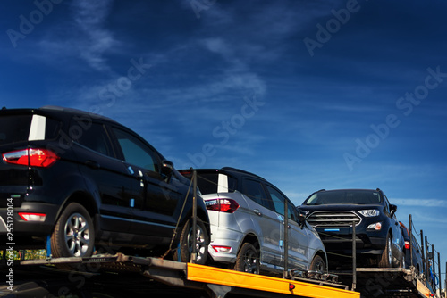 Vehicles loaded and ready for delivery dealership © Marcel Poncu