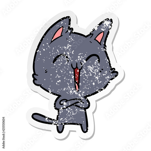 distressed sticker of a happy cartoon cat meowing