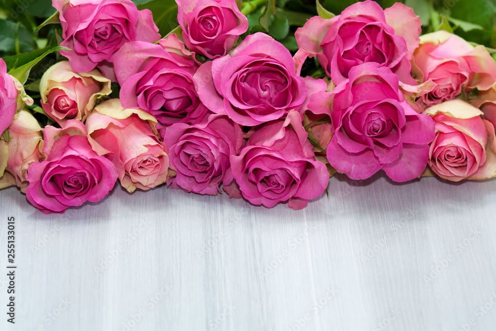 Bunch of beautiful pink roses on light background. Bunch of beautiful pink roses on light background.
