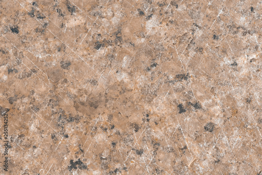 Texture of brown marble, polished natural surface, with signs of wear on the surface of the stone Texture of brown marble, polished natural surface, with signs of wear on the surface of the stone