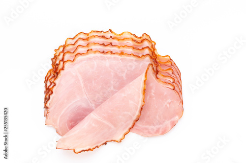 Sliced boiled ham sausage isolated on white background, top view.