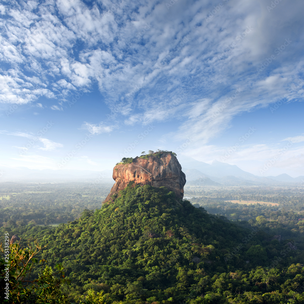 panorama Sunrise view to Sigiriya rock - Lion Rock - from Pidurangala Rock in Sri Lanka