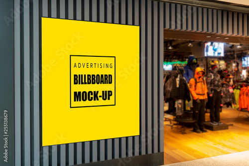 Mock up advertising billboard at front of clothing shop
