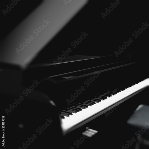 Detalle de piano de cola en espacio o habitación en la oscuridad.