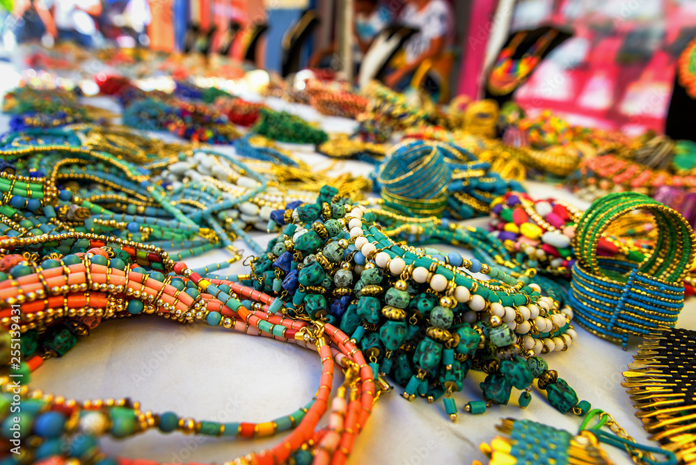 Obraz premium Colorful traditional jewelry sold at market