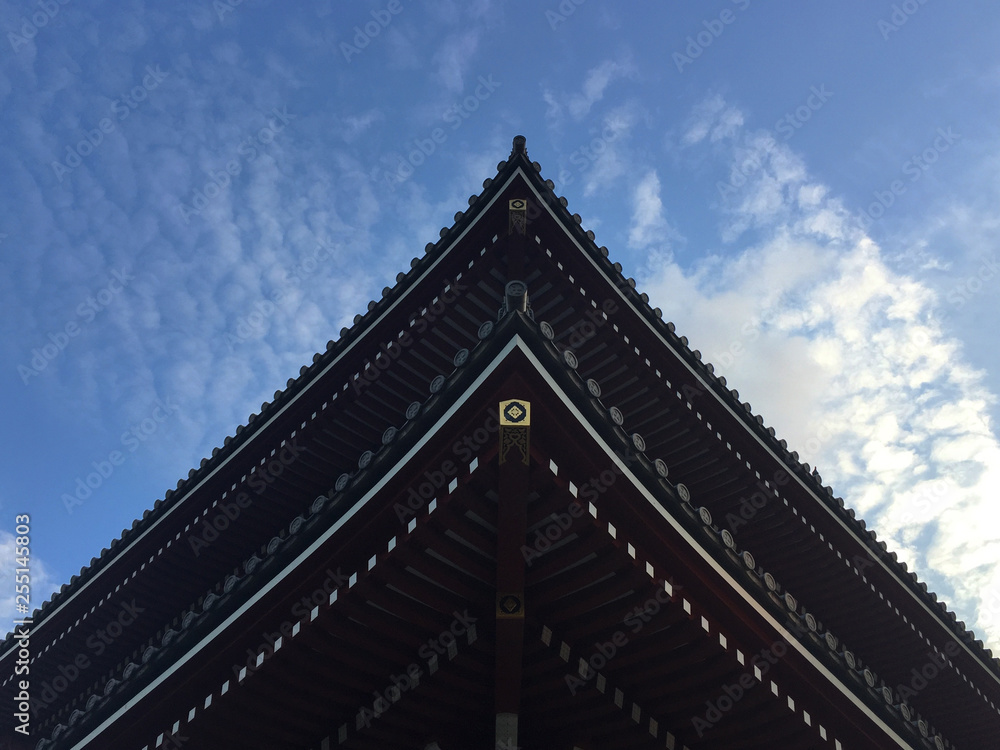 Low angle view of the beautiful wooden roof of the Senso-ji temple in Tokyo, Japan