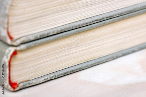 Stack old books in a light cover