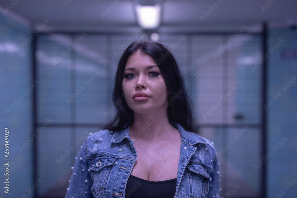 portrait of young woman with bad habits 