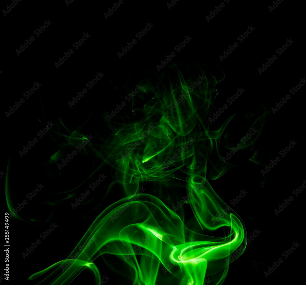 Obraz premium Green smoke on black background