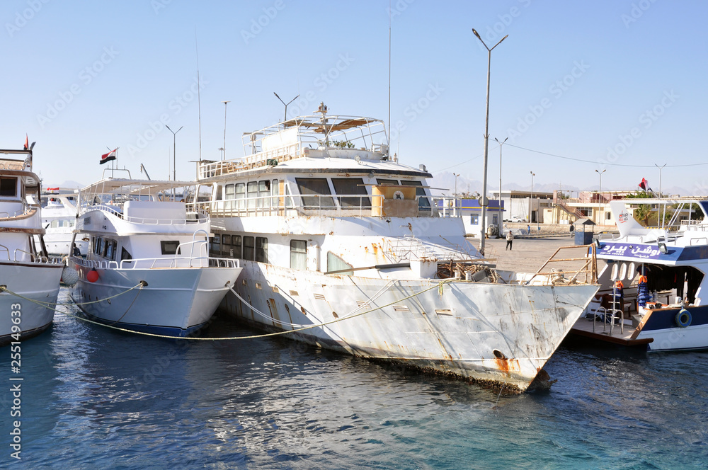 Hurghada, Egypt -  January 1, 2018, old boats on the pier