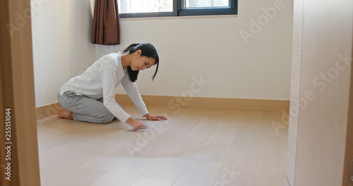 Woman clean the floor at home