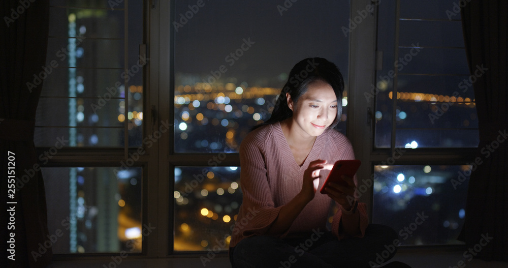 Woman use of mobile phone online Woman use of mobile phone online