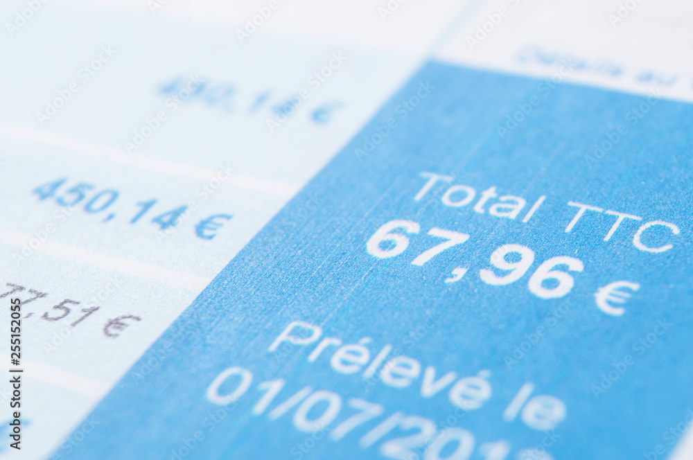 closeup of amount in euro money with taxes on french bill document closeup of amount in euro money with taxes on french bill document