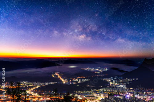 Night view from misty high mountain down town.