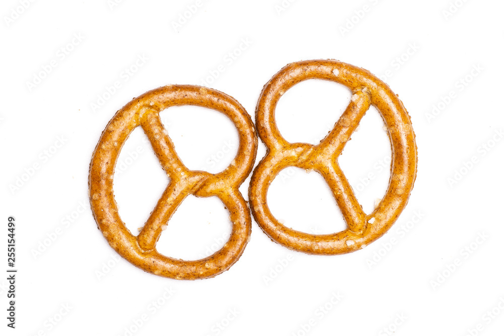 Group of two whole mini salted pretzels flatlay isolated on white background Group of two whole mini salted pretzels flatlay isolated on white background