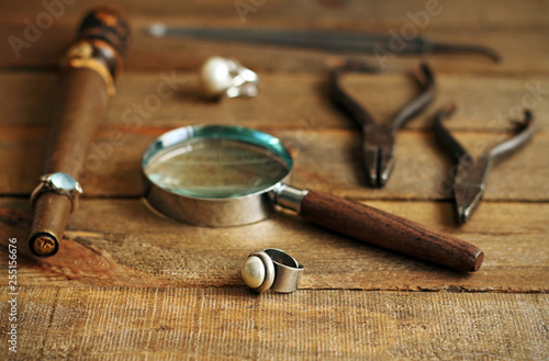 Silver and pearl rings and tools