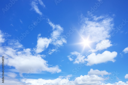 blue sky sun and clouds background