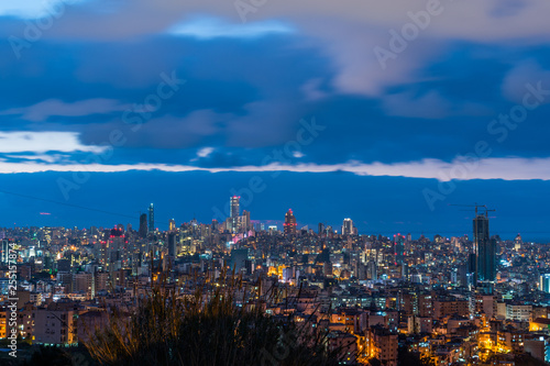 This is a capture of the sunset in Beirut capital of Lebanon with a cool blue color tone, and you can see Beirut downtown in the foreground with some beautiful cloud in the background © Edds
