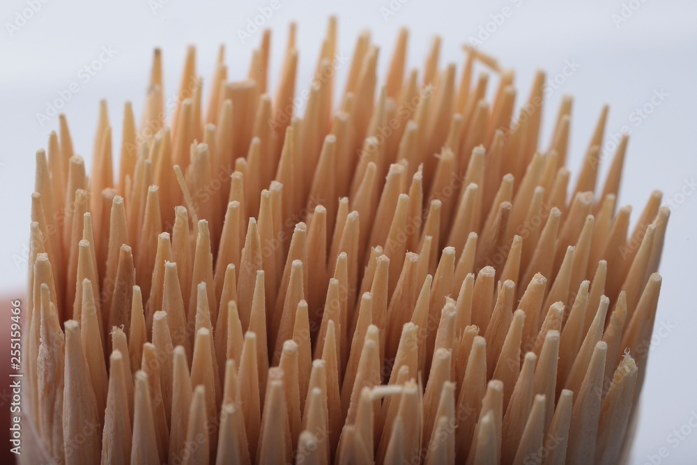 A toothpick in a dozen on a white background A toothpick in a dozen on a white background