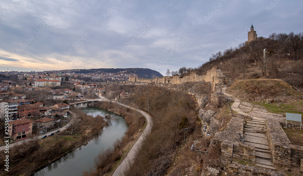 Beautiful panoramic view of medieval Tsarevets fortress in Veliko Tarnovo, Bulgaria during sunrise in the morning. the famous historical capital. Panorama. Patriarch Church on the Tsarevets hill