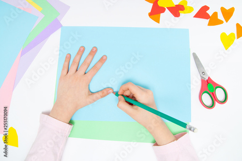 How To Make Paper Bunny For Easter Greetings And Fun Children Art Project Diy Concept Kids Hands Makes Paper Craf Step By Step Photo Instruction Step 2 Draw Hand Outline Stock Photo How To Make Paper Bunny For Easter Greetings And Fun Children Art Project Diy Concept Kids Hands Makes Paper Craf Step By Step Photo Instruction Step 2 Draw Hand Outline Stock Photo