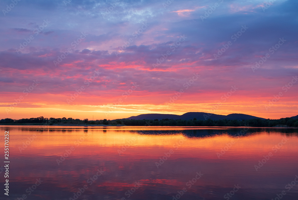 Sunset on a lake in Hohenrode in Germany