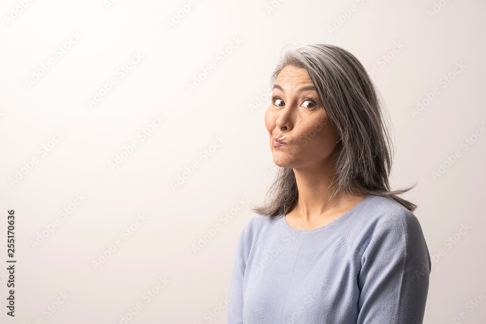 Mongolian Woman of Nationality is Thinking About Something. Mongolian Woman of Nationality is Thinking About Something.